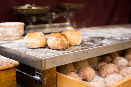 Golden buns of freshly baked wheat breadの写真素材
