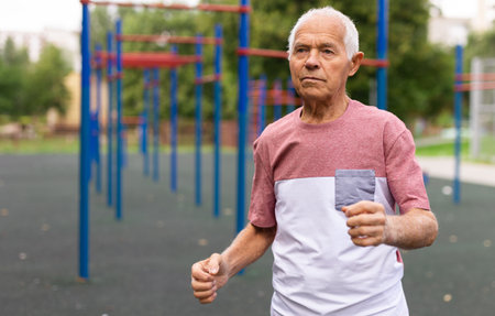 Senior man is jogging. Healthy retirement lifestyleの写真素材