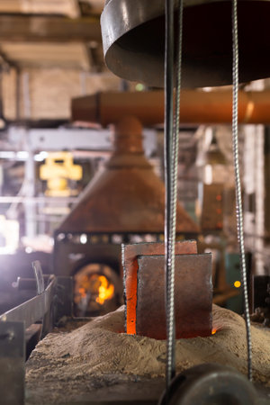 Ferrous metal billet is melted in an induction furnace closeupの写真素材