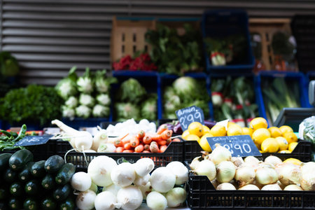 Fresh vegetables displayed on market counter