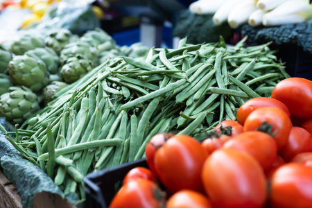 Pile of green beans displayed at marketの写真素材