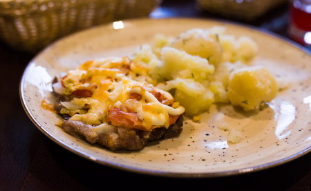 French meat with boiled potatoes served on plateの写真素材