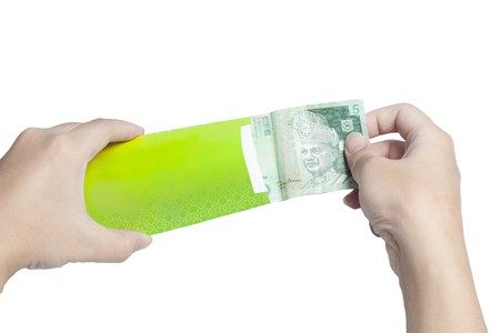 Put Money into Green Packet isolated on white background 
