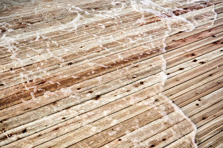 wave on a wooden dock