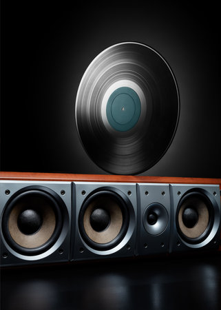 Vintage record (LP) rolling over a loud speaker. Concept of music, party, club and audiophile.の写真素材
