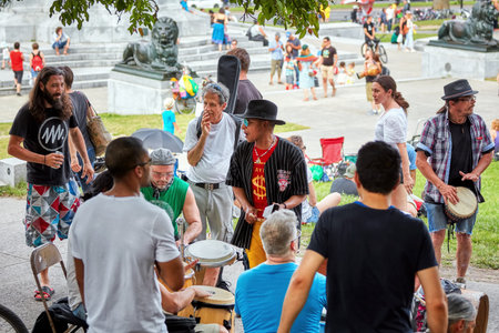 Montreal, Canada - June, 2018. Group of African American and Caucasian drummers and percussionists...