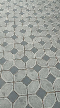 Floor tile pattern on a sidewalkの写真素材
