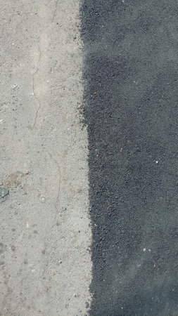 Asphalt texture of old and new layerの写真素材