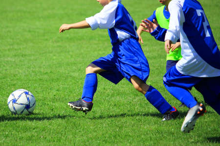 football soccer match for childrenの写真素材