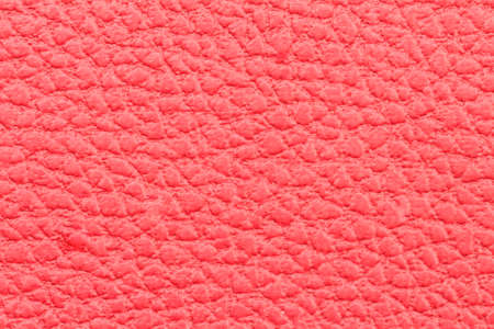 background: close-up of red leather fabricの写真素材
