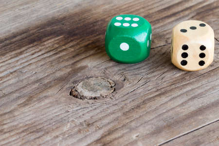 close-up of gaming dice on wooden background