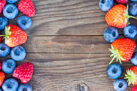 close-up of berries on a wooden background