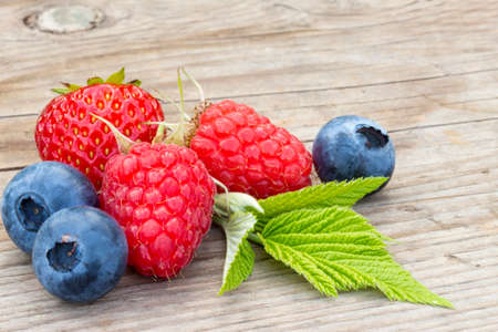 close-up of berries on a wooden backgroundの写真素材