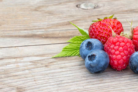 close-up of berries on a wooden backgroundの写真素材