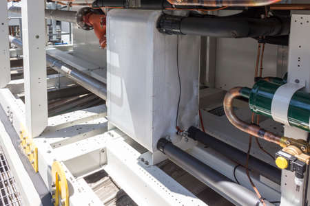 Valves and plumbing pipes in the hydraulic systemの写真素材