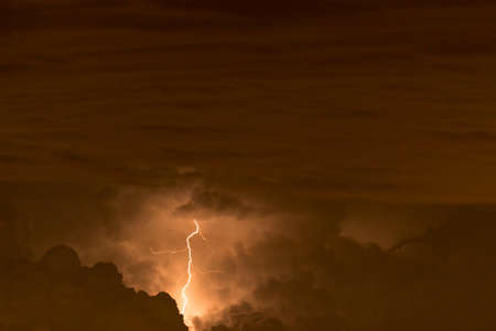 lightning in the clouds on the horizon