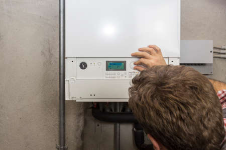 plumber who carries out the maintenance of a condensing boiler