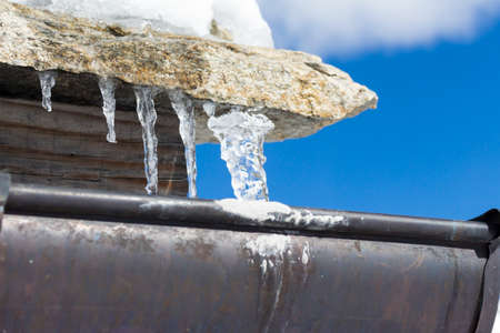 Close Up Of Icicles On The Eaves Of A House Royalty Free Images
