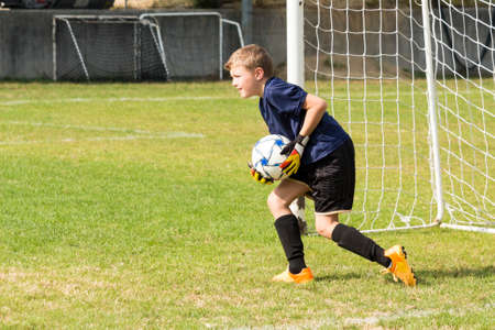 football soccer match for childrenの写真素材