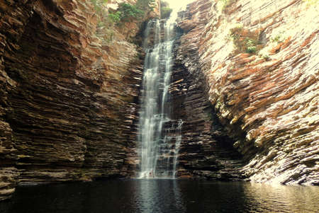 Wonderful dark waterfall pool in Chapada Diamantina, Brazil