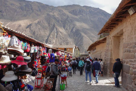 Tourists exploring the village of Ollantaytambo, on the Sacred valley of incas, Peruのeditorial素材