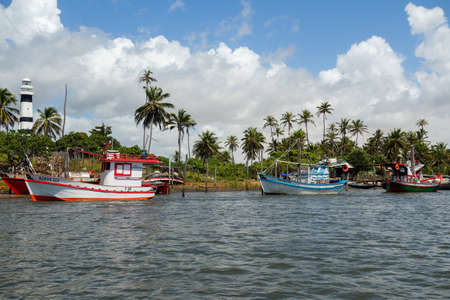 Mandacaru lighthouse and boats in the small village in Barreirinhas, Maranhao, Brazilのeditorial素材