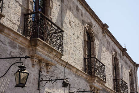 Arequipa, Peru: Old architecture facade. Porchs and vintage lampsの写真素材