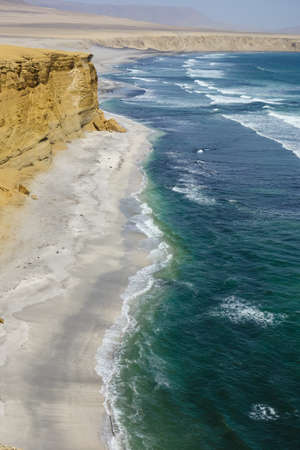 cliffs and seascape at Paracas National Reserve. Arid touristic zone in the coast of Ica, Peru