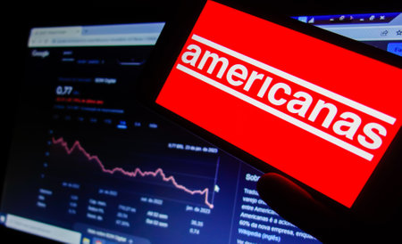 Sao Paulo, Brazil - 01.23.2023: smartphone with of Lojas Americanas, a large Brazilian retail chain, which filed for judicial protection for accounting fraud.のeditorial素材