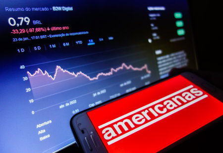 Sao Paulo, Brazil - 01.23.2023: smartphone with of Lojas Americanas, a large Brazilian retail chain, which filed for judicial protection for accounting fraud.のeditorial素材
