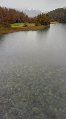 beautiful crystalline river in Argentine patagonia, during autumn.