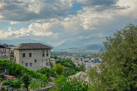 cityscape of Gjirokaster in Albania, with Ottoman architecture preserved on the World Heritage List.
