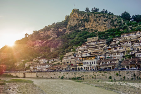 facades of old houses in Berat city, Albania, at sunset. the UNESCO World Heritage Site.