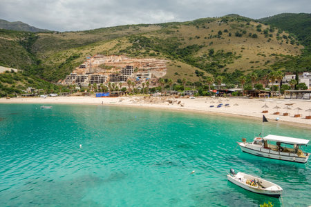 panoramic of Jale Beach in Himara, Albanian riviera. Resorts construction in background.の写真素材