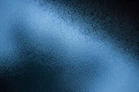 Black and Blue Glass Texture in a Windowの写真素材