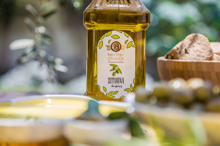 illustrative editorial olive oil brand, most commonly used oil in cooking, pressed from fresh olives. primarily produced in Mediterranean region. selective focus, shallow depth of field, Cairo Egyptのeditorial素材