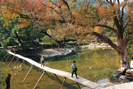 People walking on the wooden bridgeのeditorial素材