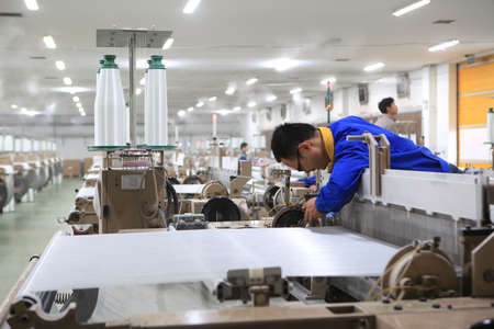 Scene from the production line of a spinning factory