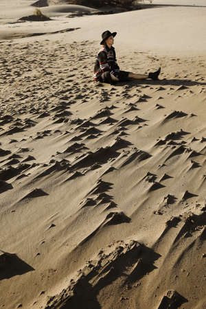 Young woman enjoying sunny weather on the beach. Outdoor.の写真素材