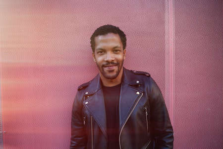 Attractive black Caribbean man have fun.