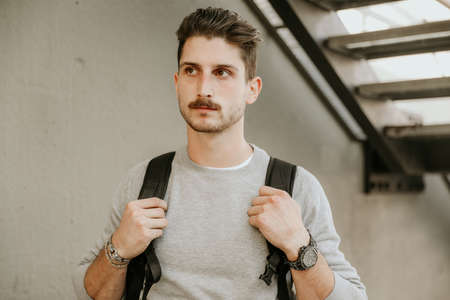 Close-up portrait of young handsome bearded hipster man. Life style picture.の写真素材