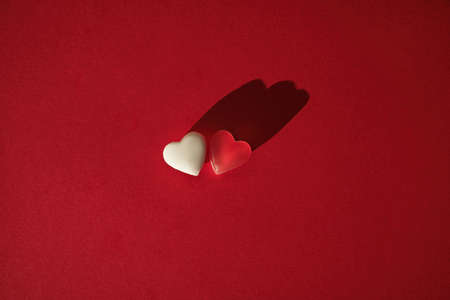 Top view of sweet candies heart shape, mock up red heart. Valentine day concept.