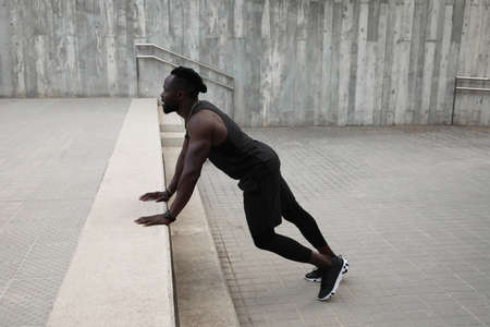 Black afro man doing workout outdoor, health and lifestyle concept.の写真素材