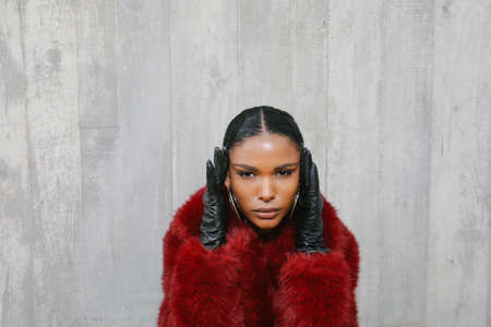 Beautiful black woman. Beauty portrait of African American woman posing outdoor.の写真素材