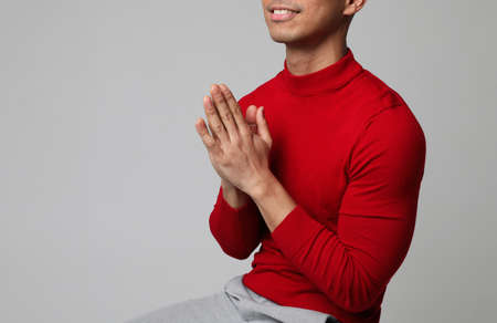 Cropped portrait of young man posing indoor. Concept of businessman. Mock up.