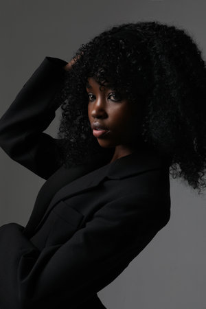 Young woman with calm face expression. Mindset and mental health. Vertical.の写真素材