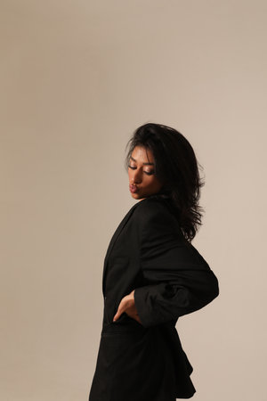 Portrait of young woman posing on the white background. Isolated.