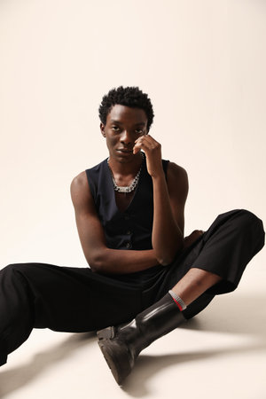 Confident young man posing indoor. Vertical mock-up.の写真素材