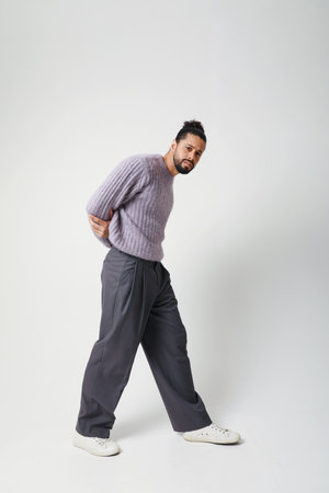 Handsome young man, posing indoor. Mind set and mental health. Vertical.の写真素材