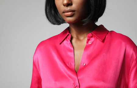 Cropped portrait of African American young woman posing indoor. Mock-up.の写真素材